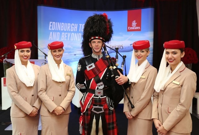 Scottish bagpiper with Emirates Crew
