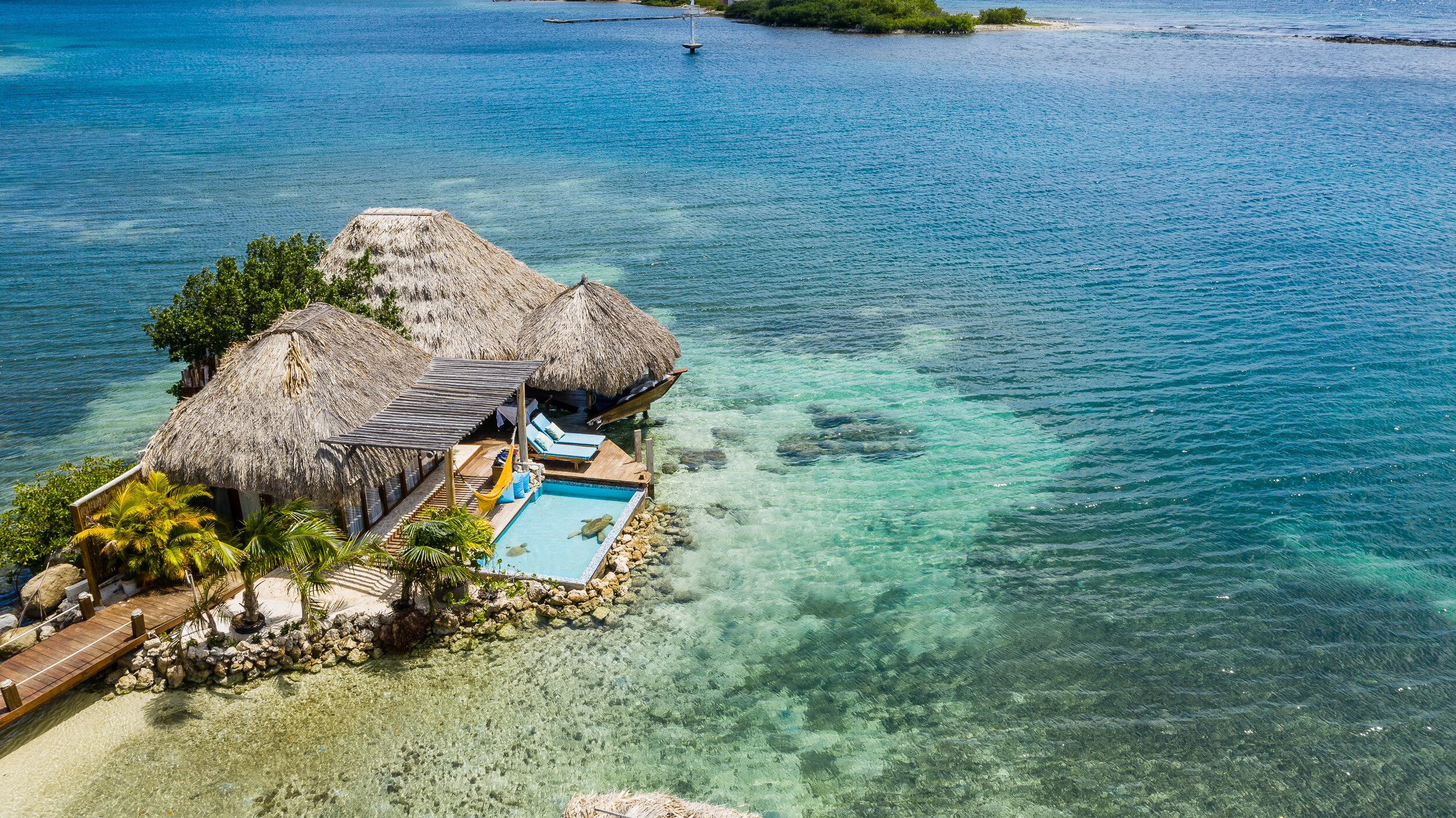 Where Can You Find Luxury Overwater Villa Besides the Maldives? 4 ARUBA OCEAN VILLAS