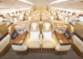 Emirates Boeing 777 Premium Economy cabin featuring leather seats and modern design